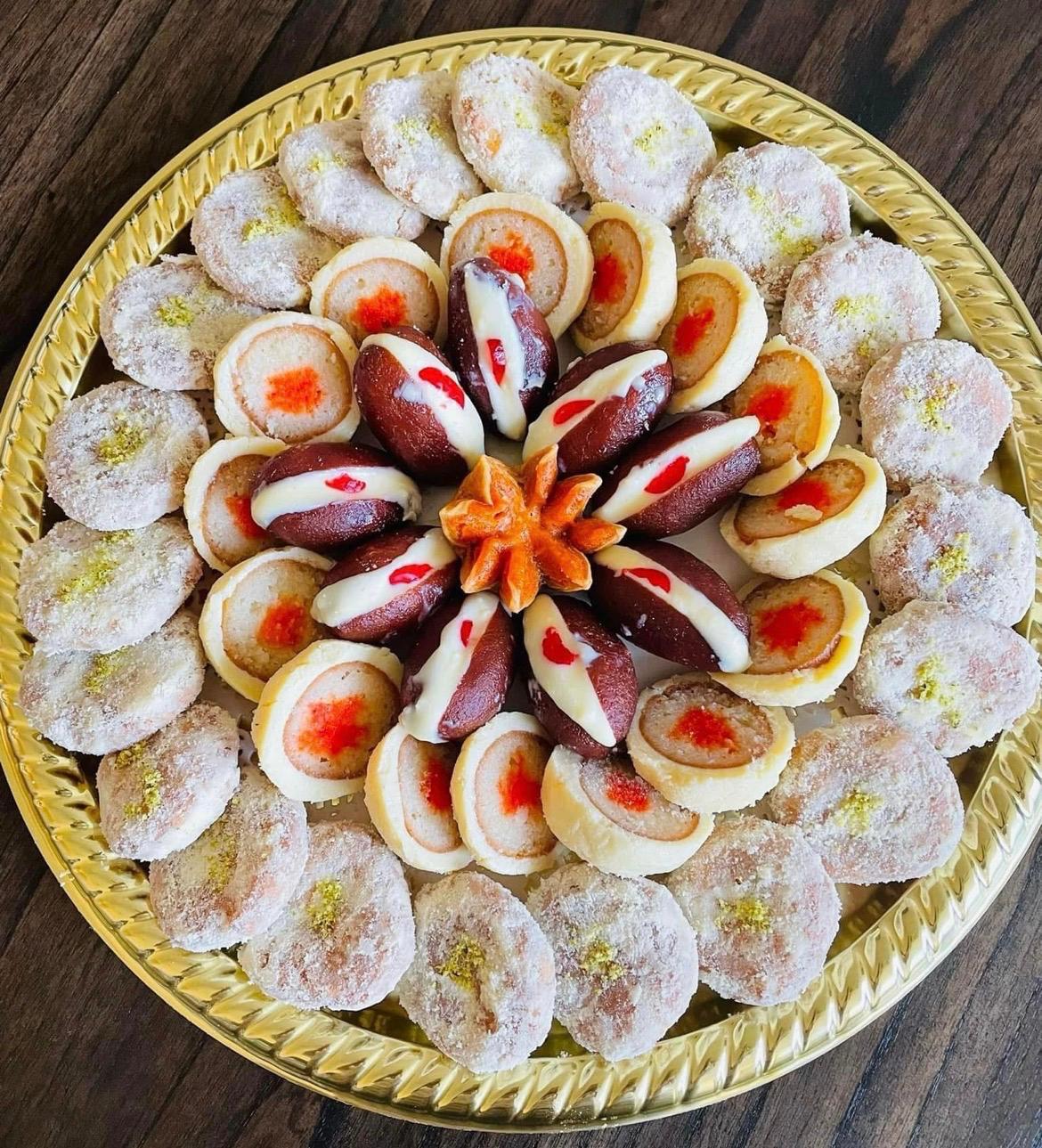Specialty platter with cream jam, pinwheel sandesh and balushai